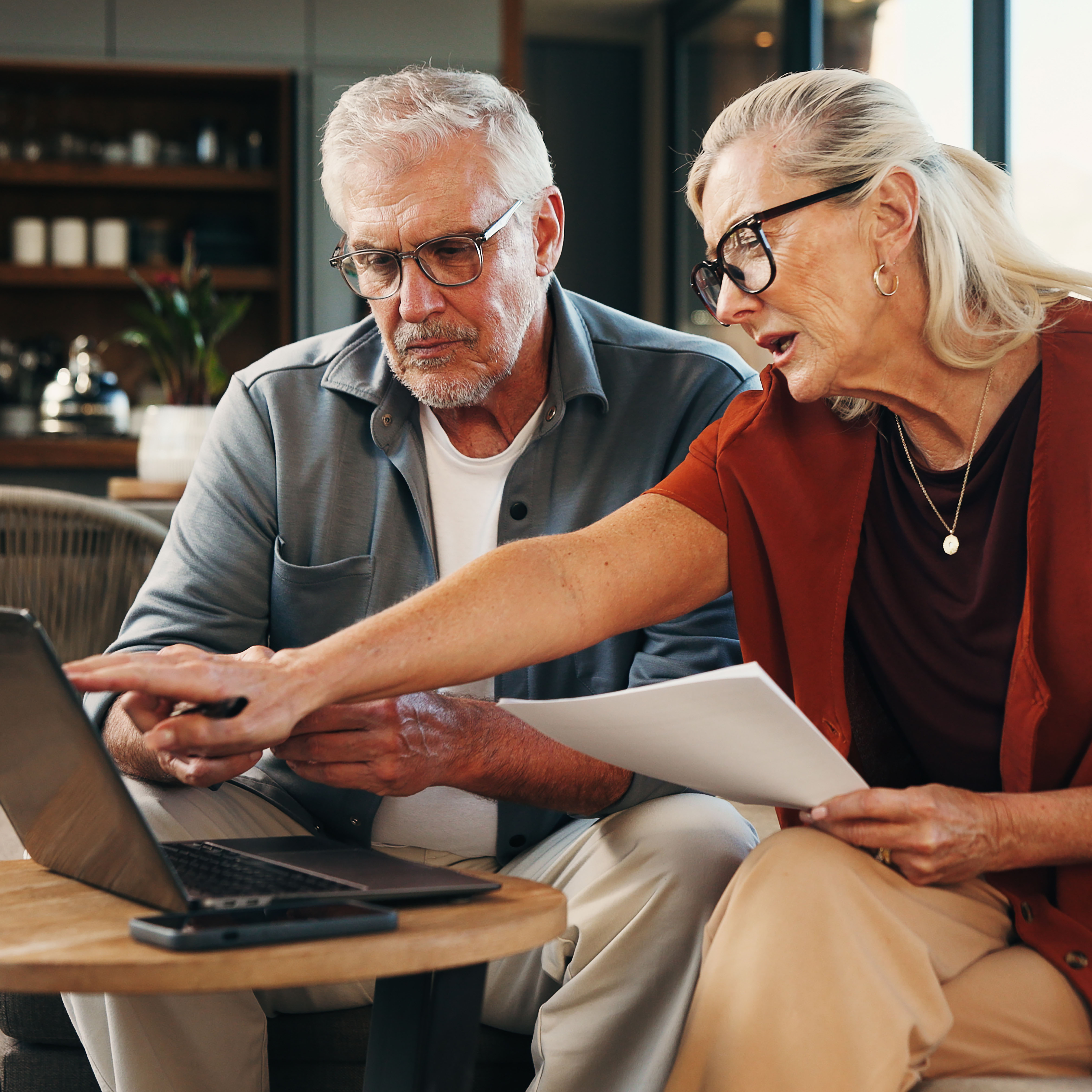 Couple using a laptop