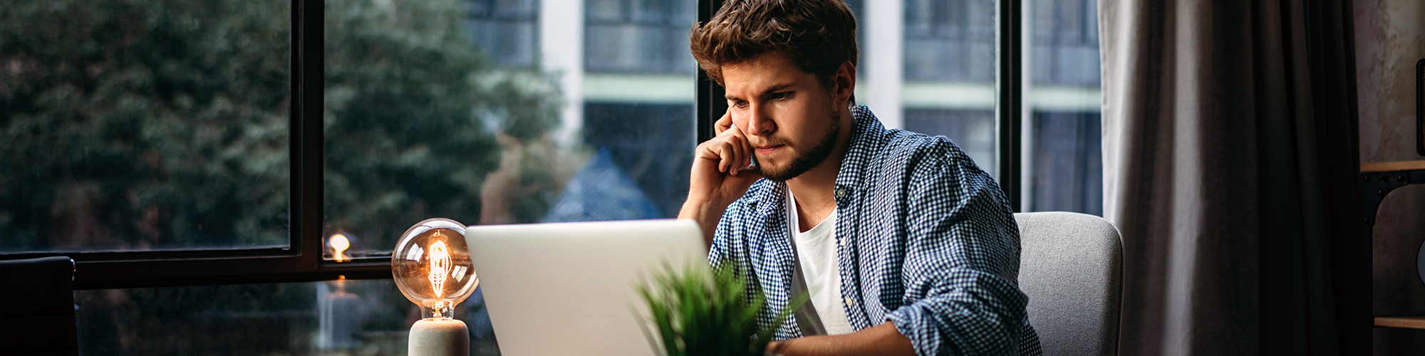 Man working on the laptop | Essential digital skills course | Digital Wings