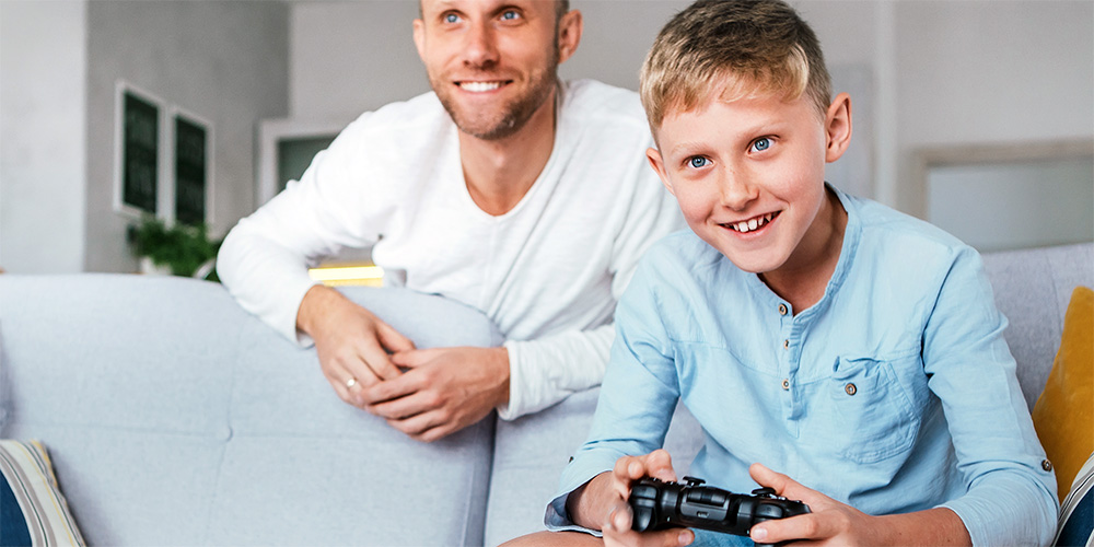 Father and son gaming together