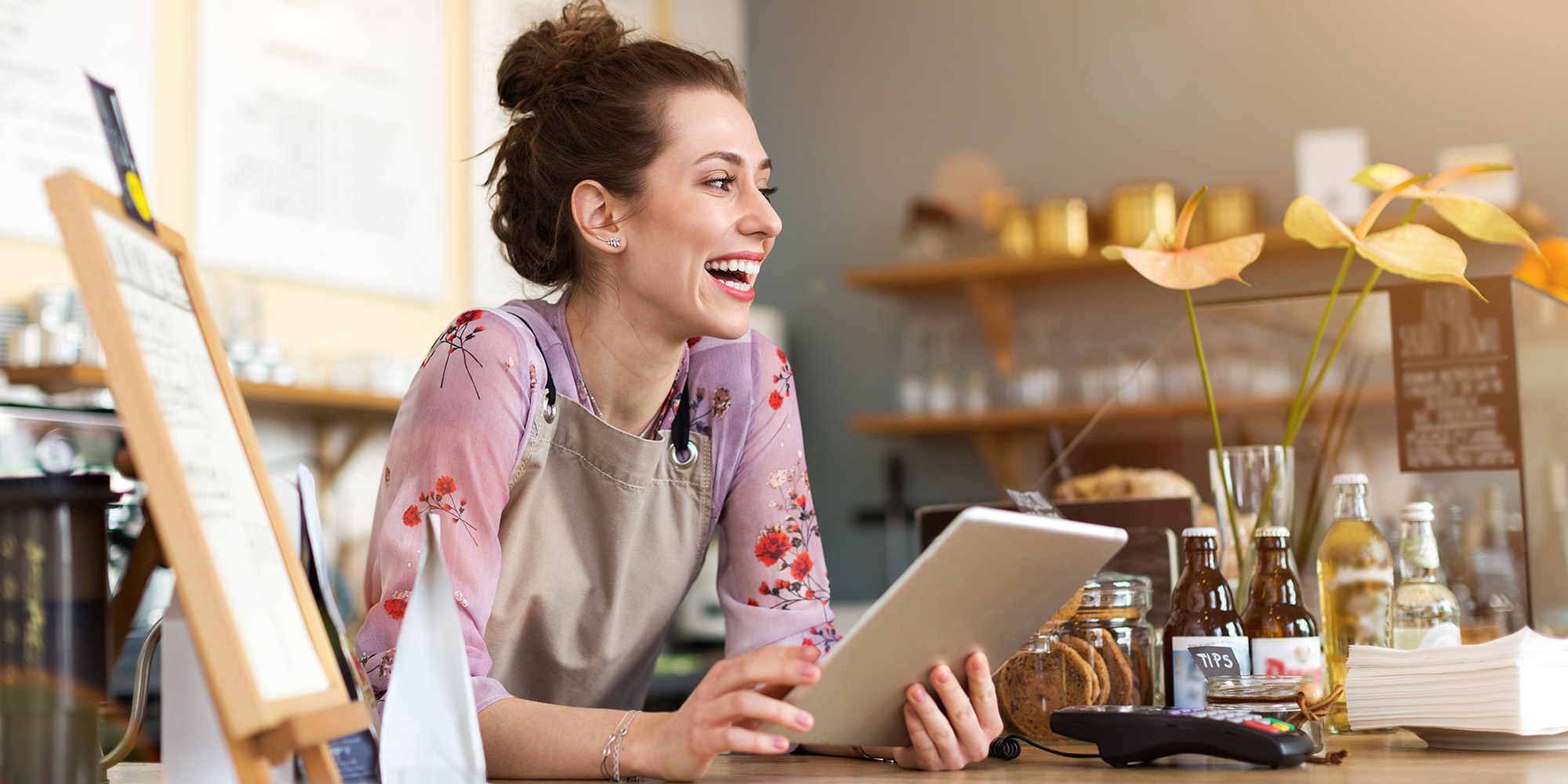 Influencer, using her tablet to discuss her products.