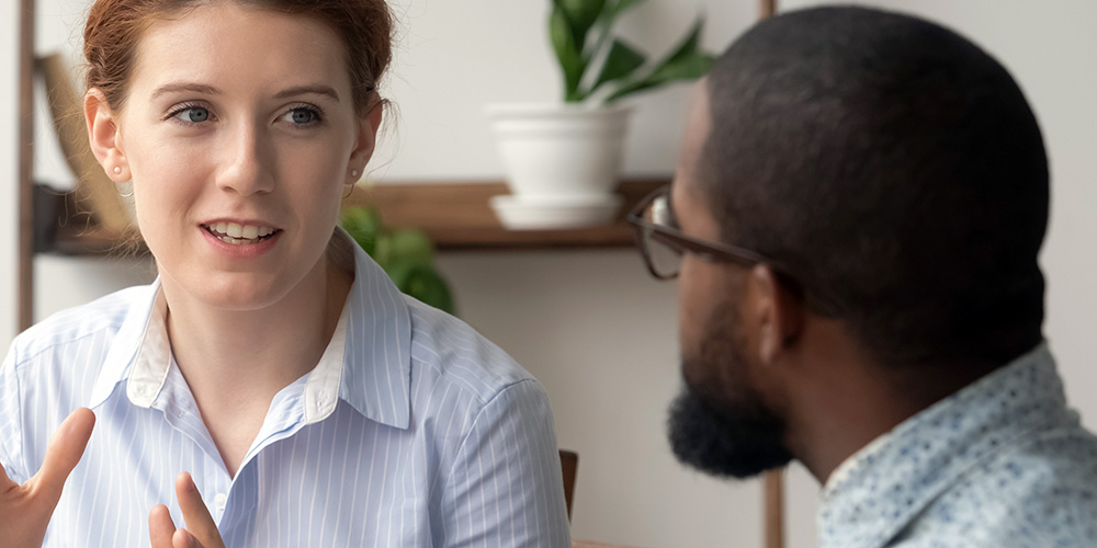 Two colleagues in conversation