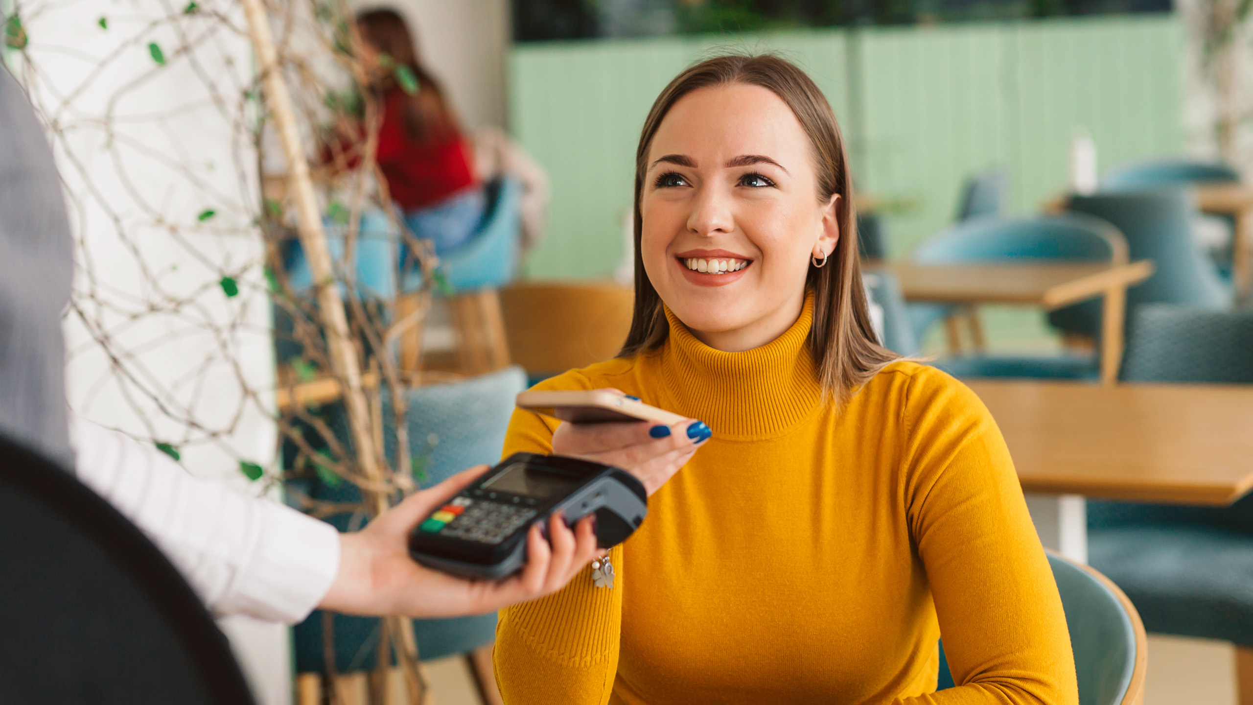 Person paying with contactless