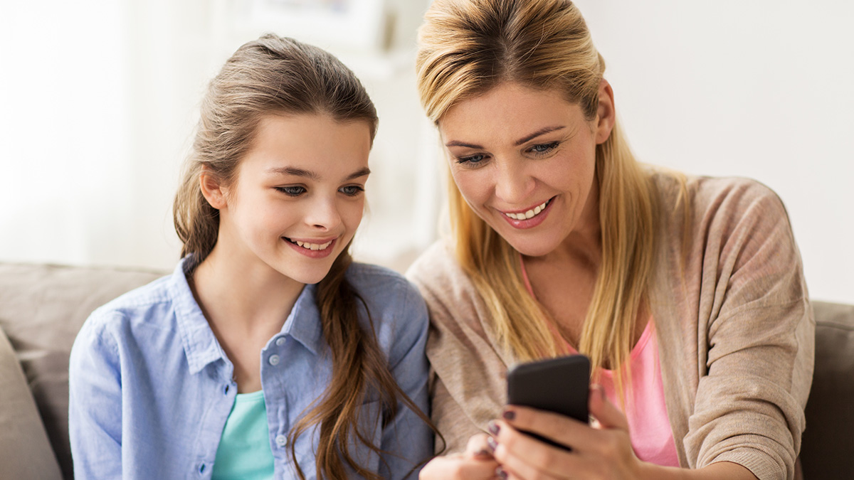 parent and child taking a selfie