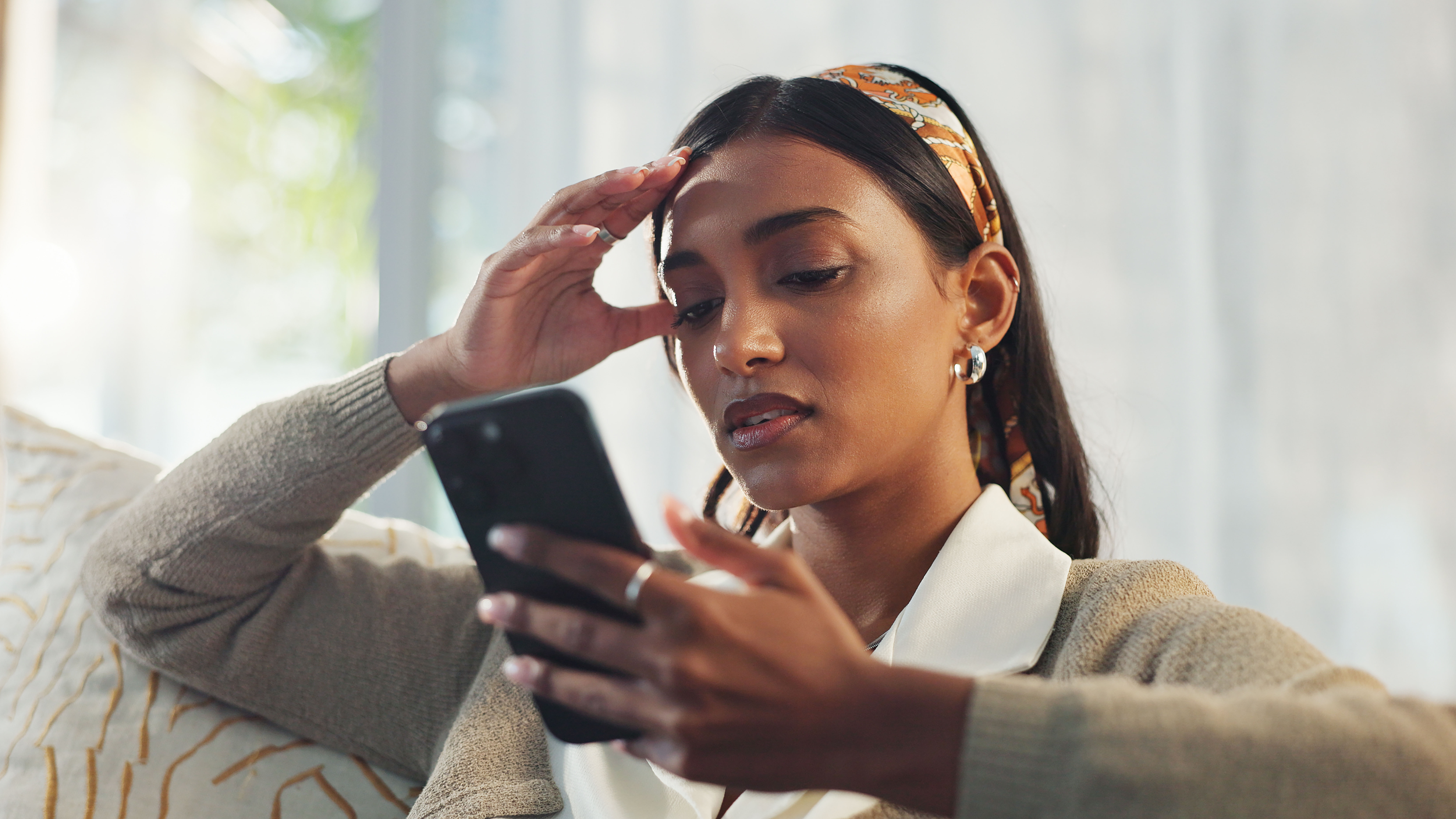 Person looking at a mobile phone