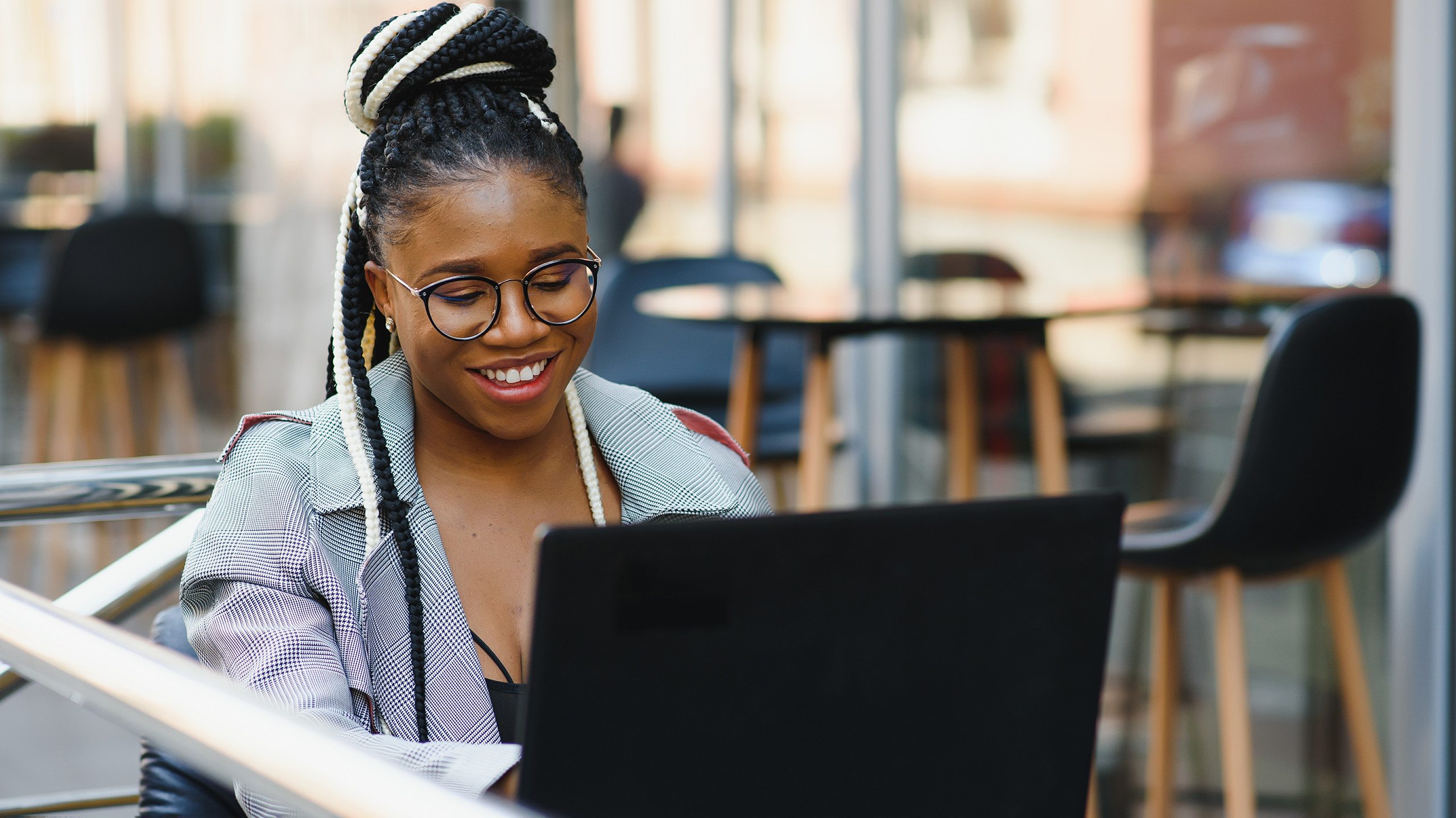 Person reading on a laptop