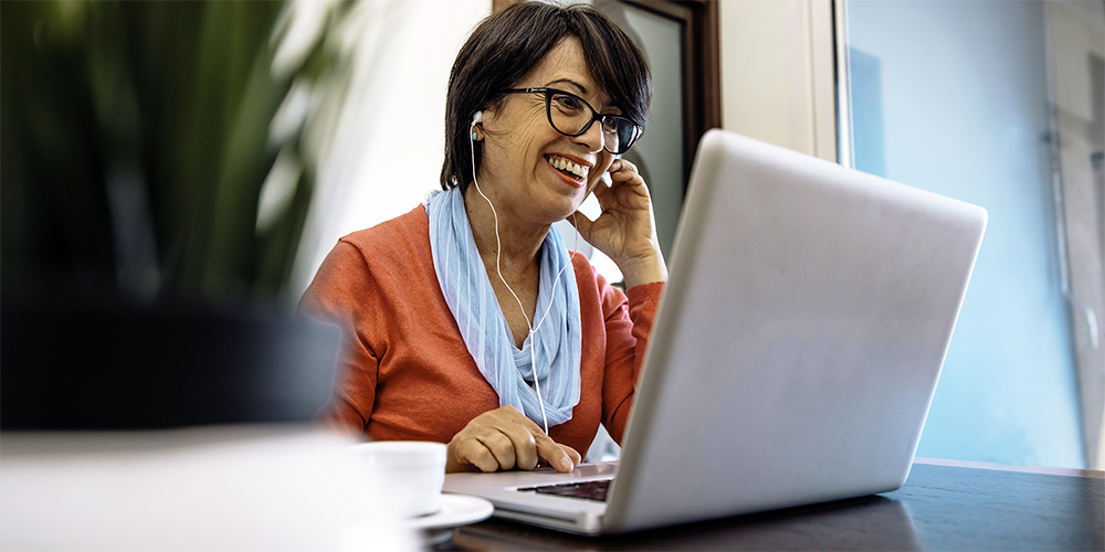 Worker smiling while on a call